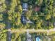 Aerial view of the neighborhood showing large private lots with mature trees at 8503 Foxbridge Dr # 16, Matthews, NC 28104