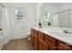 Bathroom with shower/tub combo, single vanity, and updated fixtures at 9667 Laurie Nw Ave, Concord, NC 28027