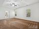 Bright bedroom with ceiling fan and neutral carpeting at 9667 Laurie Nw Ave, Concord, NC 28027