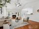 Cozy living room with fireplace and hardwood floors at 9667 Laurie Nw Ave, Concord, NC 28027