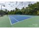 Two tennis courts with green and blue surface at 9667 Laurie Nw Ave, Concord, NC 28027