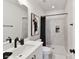 Elegant bathroom with marble tile, sleek fixtures, and a modern shower at 3020 Endhaven Terraces Ln # 10, Charlotte, NC 28277