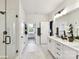Modern bathroom featuring a glass-enclosed shower, double vanity, and stylish black fixtures at 3020 Endhaven Terraces Ln # 10, Charlotte, NC 28277