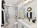 Stylish bathroom with a bathtub, shower combination, and a modern vanity with elegant decor at 3020 Endhaven Terraces Ln # 10, Charlotte, NC 28277