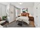Stylish bedroom features a comfortable bed, modern decor, and plenty of natural light at 3020 Endhaven Terraces Ln # 10, Charlotte, NC 28277