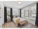 Cozy bedroom with large windows, neutral decor, and a comfortable rug adding warmth at 3020 Endhaven Terraces Ln # 10, Charlotte, NC 28277