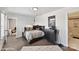 Comfortable bedroom with modern furnishings, a stylish bed, and ample natural light at 3020 Endhaven Terraces Ln # 10, Charlotte, NC 28277