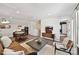 Spacious living room with modern furniture, stylish decor, and an open layout at 3020 Endhaven Terraces Ln # 10, Charlotte, NC 28277