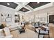 Open-concept living and dining area with modern finishes and lots of natural light at 3020 Endhaven Terraces Ln # 10, Charlotte, NC 28277