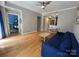 Bright living room with hardwood floors and a comfy sofa at 715 N Church St # 304, Charlotte, NC 28202