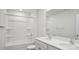 Bright bathroom featuring a tub, shower, and double sink vanity at 112 Rustling Waters Dr, Mooresville, NC 28117