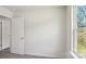 Bright bedroom featuring a window with natural light and neutral walls at 112 Rustling Waters Dr, Mooresville, NC 28117