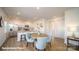 Open dining area adjacent to a modern kitchen with stainless steel appliances at 112 Rustling Waters Dr, Mooresville, NC 28117