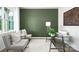 Home office with glass desk, two chairs, and green accent wall at 3925 Coleman Dr, Charlotte, NC 28215