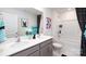 Modern bathroom with double vanity and shower/tub combo at 5211 Reedy Ridge Rd, Charlotte, NC 28215