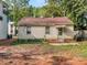 Backyard of the house, mostly dirt and grass at 2117 Laburnum Ave, Charlotte, NC 28205