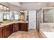 Large bathroom with double vanities and a soaking tub at 4730 Rollins Pointe Dr, Monroe, NC 28110