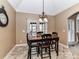 Charming breakfast nook with a wood table and four chairs at 4730 Rollins Pointe Dr, Monroe, NC 28110