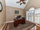 Home office with built-in desk and large windows at 4730 Rollins Pointe Dr, Monroe, NC 28110