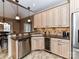 Kitchen features granite countertops, custom cabinetry, and wine cooler at 4730 Rollins Pointe Dr, Monroe, NC 28110