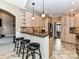 Kitchen with light wood cabinets and granite countertops at 4730 Rollins Pointe Dr, Monroe, NC 28110