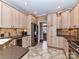 Spacious kitchen with stainless steel appliances and island at 4730 Rollins Pointe Dr, Monroe, NC 28110