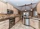 Spacious kitchen with stainless steel appliances and granite countertops at 4730 Rollins Pointe Dr, Monroe, NC 28110