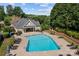 Relaxing community pool with lounge chairs and cabana at 263 Fernbrook Dr, Mooresville, NC 28117