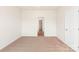 An empty room with neutral carpet, perfect for creating your own personalized haven at 3607 Clover Valley Dr, Gastonia, NC 28052