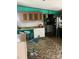 Kitchen with teal walls, wood cabinets, and island at 5820 Scotland Yard Rd, Rock Hill, SC 29732