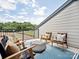 Outdoor balcony featuring comfortable seating and stunning views of the surrounding landscape at 97 Seven Oaks Lndg, Belmont, NC 28012