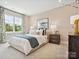 Beautifully staged bedroom with natural light, stylish decor, and cozy atmosphere at 97 Seven Oaks Lndg, Belmont, NC 28012