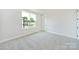 Neutral bedroom features a window and carpet at 97 Seven Oaks Lndg, Belmont, NC 28012