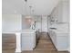 Modern kitchen featuring gray cabinets, white countertops, stainless appliances, and a central island with sink at 97 Seven Oaks Lndg, Belmont, NC 28012