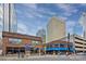 Charming street view with the Valhalla Pub & Eatery, surrounded by modern buildings and pedestrian activity at 1340 Hamilton St # 3, Charlotte, NC 28206