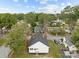 An aerial view showing the house's rear and a nearby water tower at 225 York Ave, Kannapolis, NC 28083