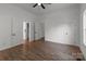 Spacious bedroom with wood floors and multiple doors at 225 York Ave, Kannapolis, NC 28083