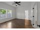 Bright bedroom with wood floors and ceiling fan at 225 York Ave, Kannapolis, NC 28083