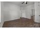 Large bedroom with wood floors and access to bathroom at 225 York Ave, Kannapolis, NC 28083