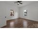 Bright bedroom featuring hardwood floors and two windows at 225 York Ave, Kannapolis, NC 28083