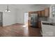 Modern kitchen with stainless steel appliances and wood cabinets at 225 York Ave, Kannapolis, NC 28083