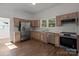 Modern kitchen with stainless steel appliances and white cabinets at 225 York Ave, Kannapolis, NC 28083