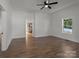 Hardwood floor living room with an open view to the kitchen at 225 York Ave, Kannapolis, NC 28083