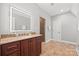 Modern bathroom with granite vanity, lighted mirror, and large shower at 5942 Carmel Rd, Charlotte, NC 28226