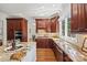 Modern kitchen with stainless steel appliances and granite counters at 5942 Carmel Rd, Charlotte, NC 28226