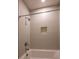 Clean bathroom with shower/tub combo and updated fixtures at 621 Seldon Dr, Charlotte, NC 28216