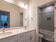 Bathroom with double vanity and a tub shower combo at 621 Seldon Dr, Charlotte, NC 28216