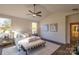 Spacious bedroom with high ceilings, a ceiling fan, and plenty of natural light at 621 Seldon Dr, Charlotte, NC 28216