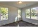 Bright bedroom with hardwood floors and large windows at 621 Seldon Dr, Charlotte, NC 28216