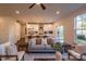 Open concept living room with gray sofa and hardwood floors at 621 Seldon Dr, Charlotte, NC 28216